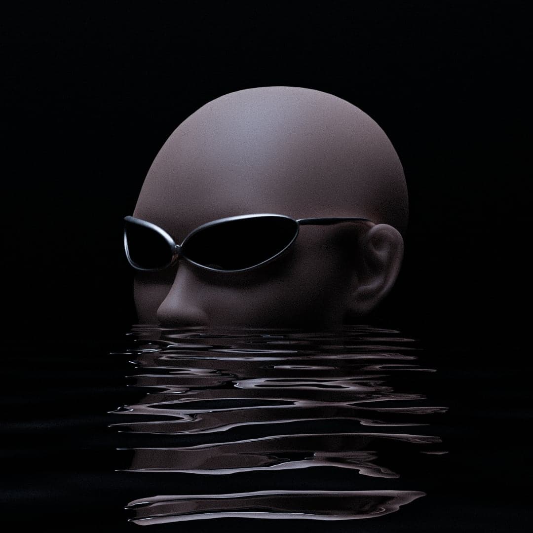 A bald head wearing the glasses, half-submerged in still black water, its reflection rippling below.