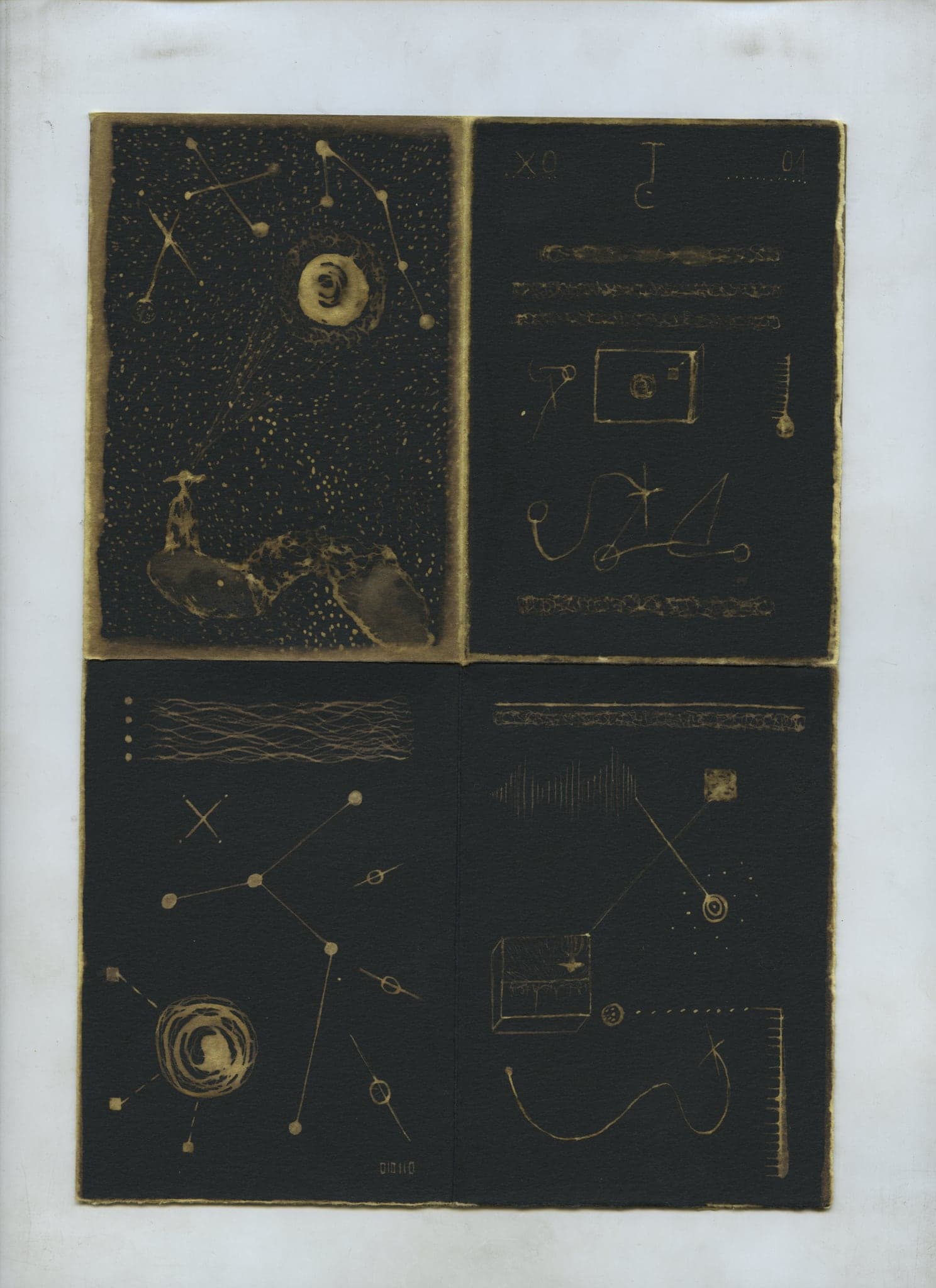 A spread divided into four framed panels, each holding its own small drawn scene in gold on black