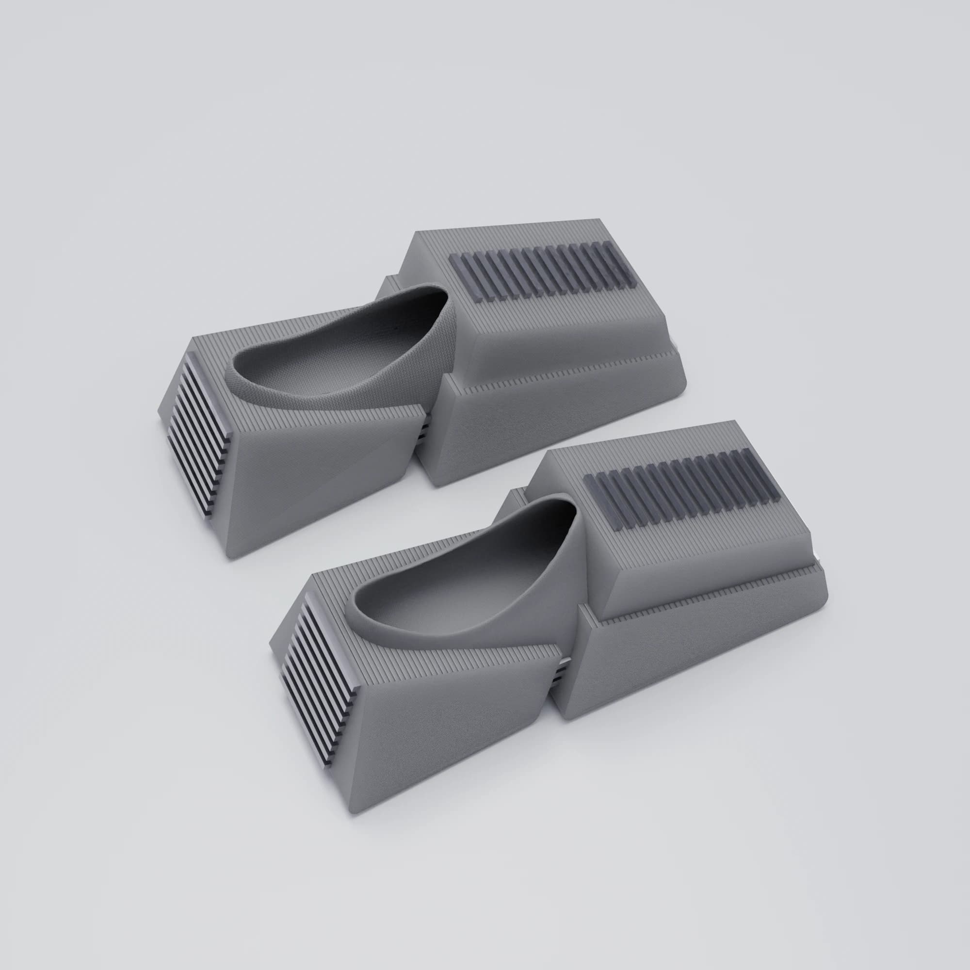 The same block shoes at a lower angle, showing the moulded pocket inside where the foot sits and the stack of louvre slots at the heel.