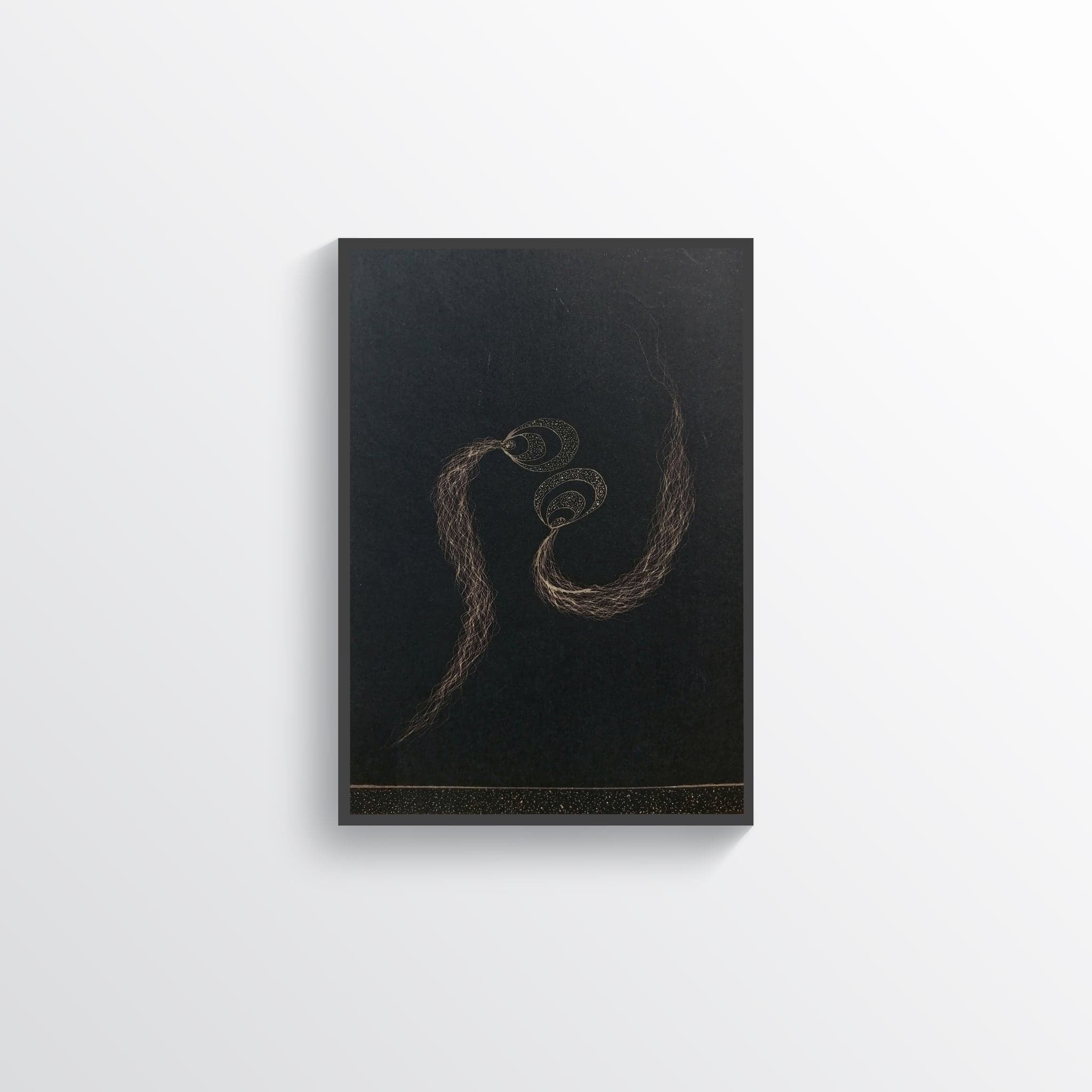 A black sheet with a form that doubles back on itself, two small spiral heads at the top and a curving tail below