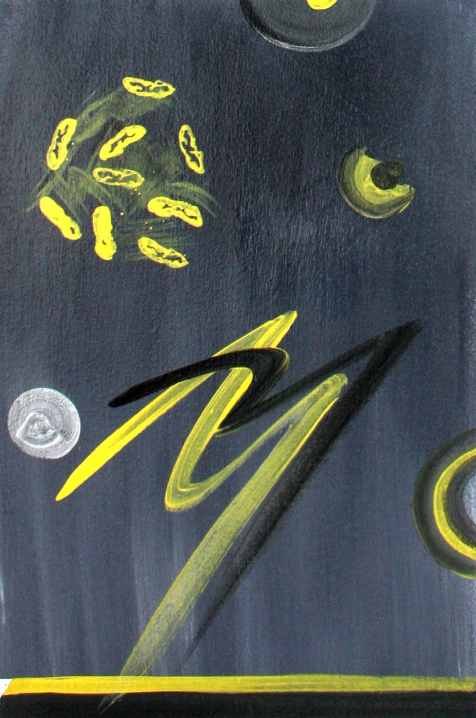 A dark panel scattered with small yellow leaf shapes above a broad black and yellow diagonal