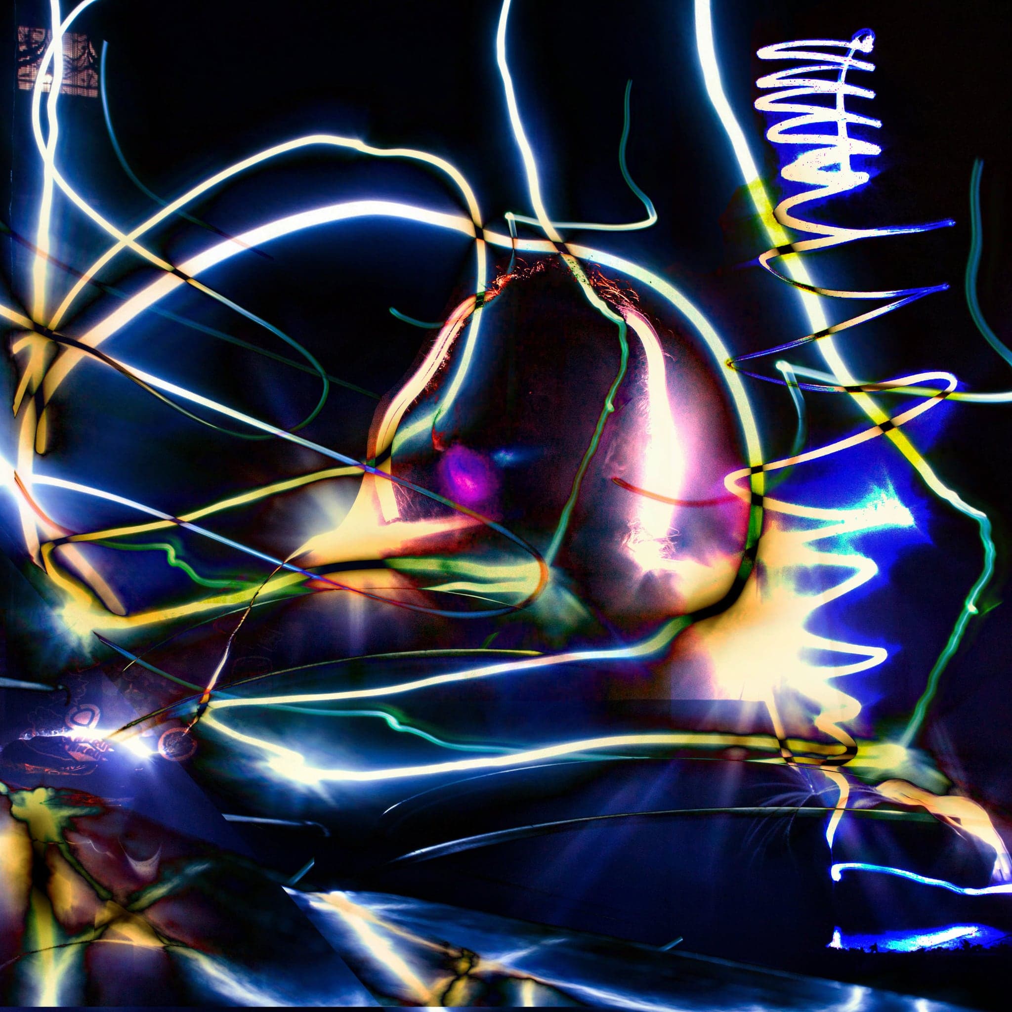 Square image on near-black: a pale central form ringed by looping white, yellow and cyan light trails, with a violet flare at its centre.