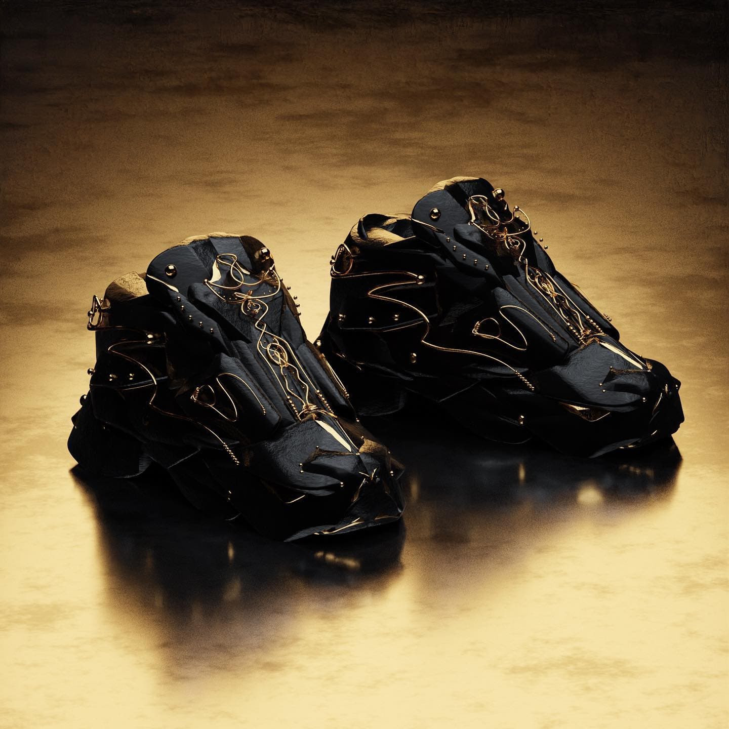 The pair from the front on a warm reflective ground, the gold linework catching the light across both shoes