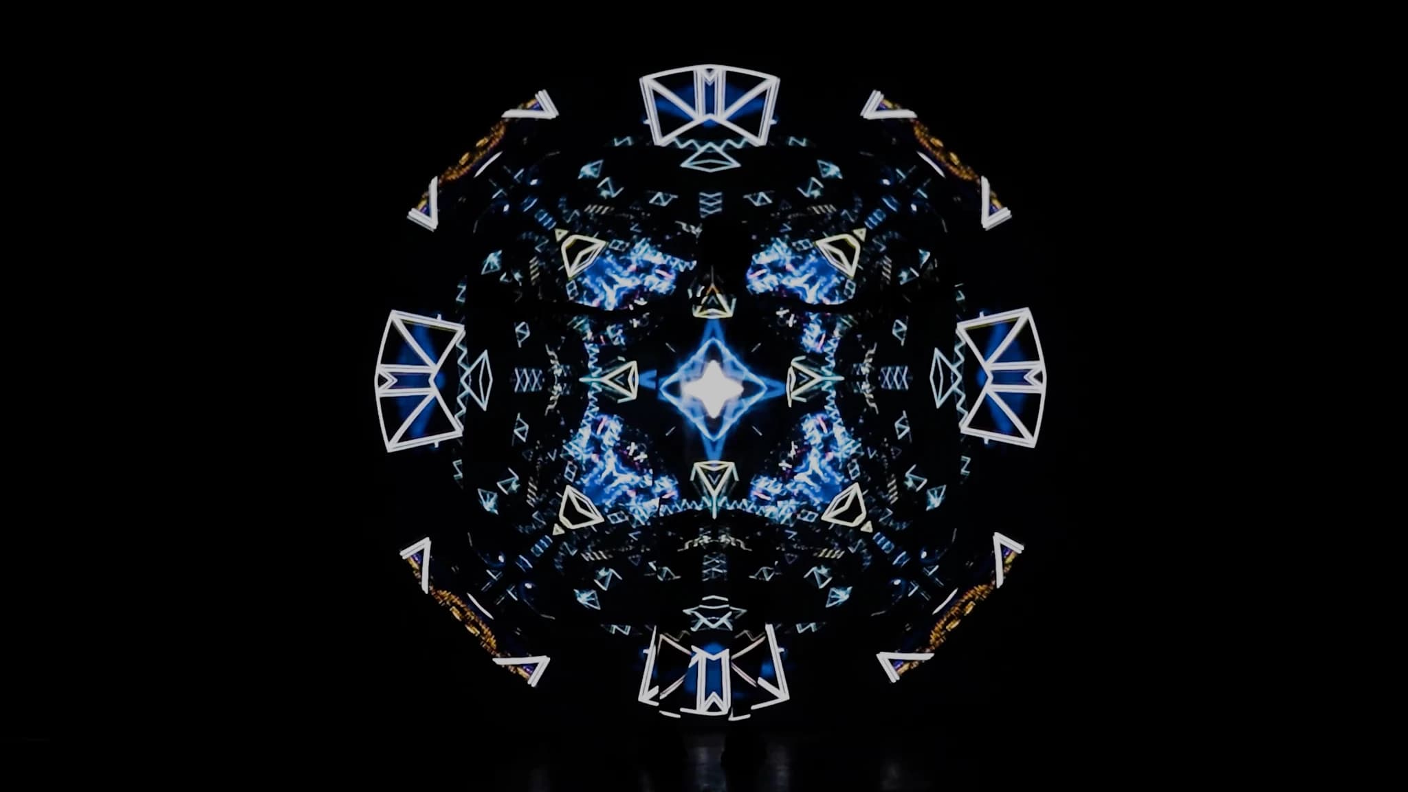 A cooler phase of the loop — white and blue wire triangles radiating from the centre
