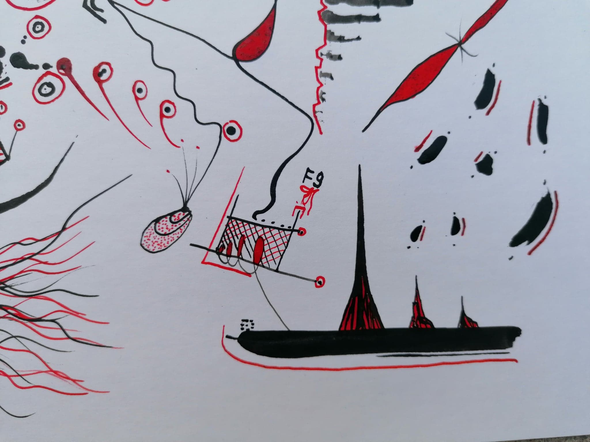 Close view of the black plume rising off a flat base with red flame shapes around it and a red F9 to the right