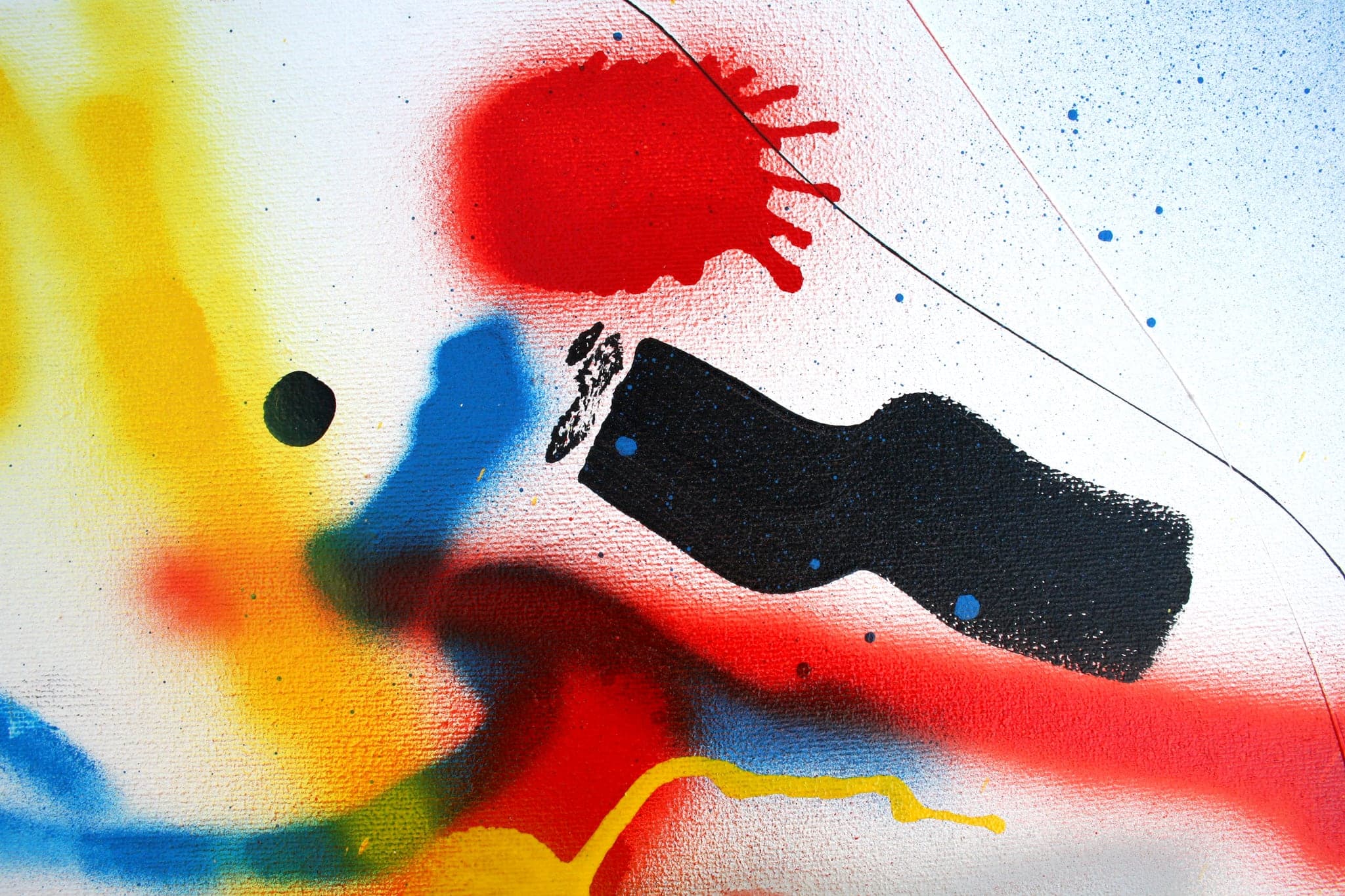 Close view: a red splat throwing fingers, a black dot beside it, yellow beneath.