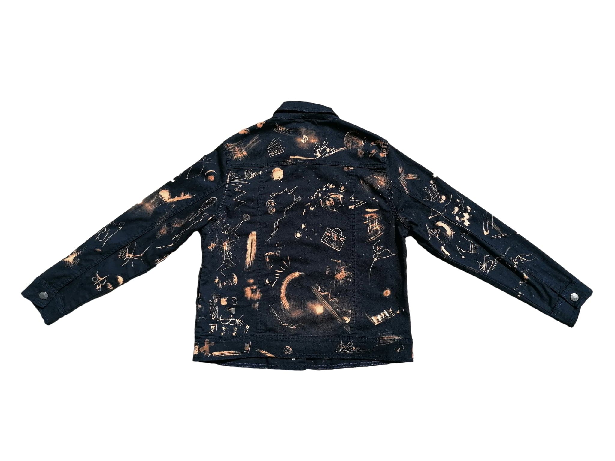 The back of the jacket flat on white, the same vocabulary of marks spread across the shoulders
