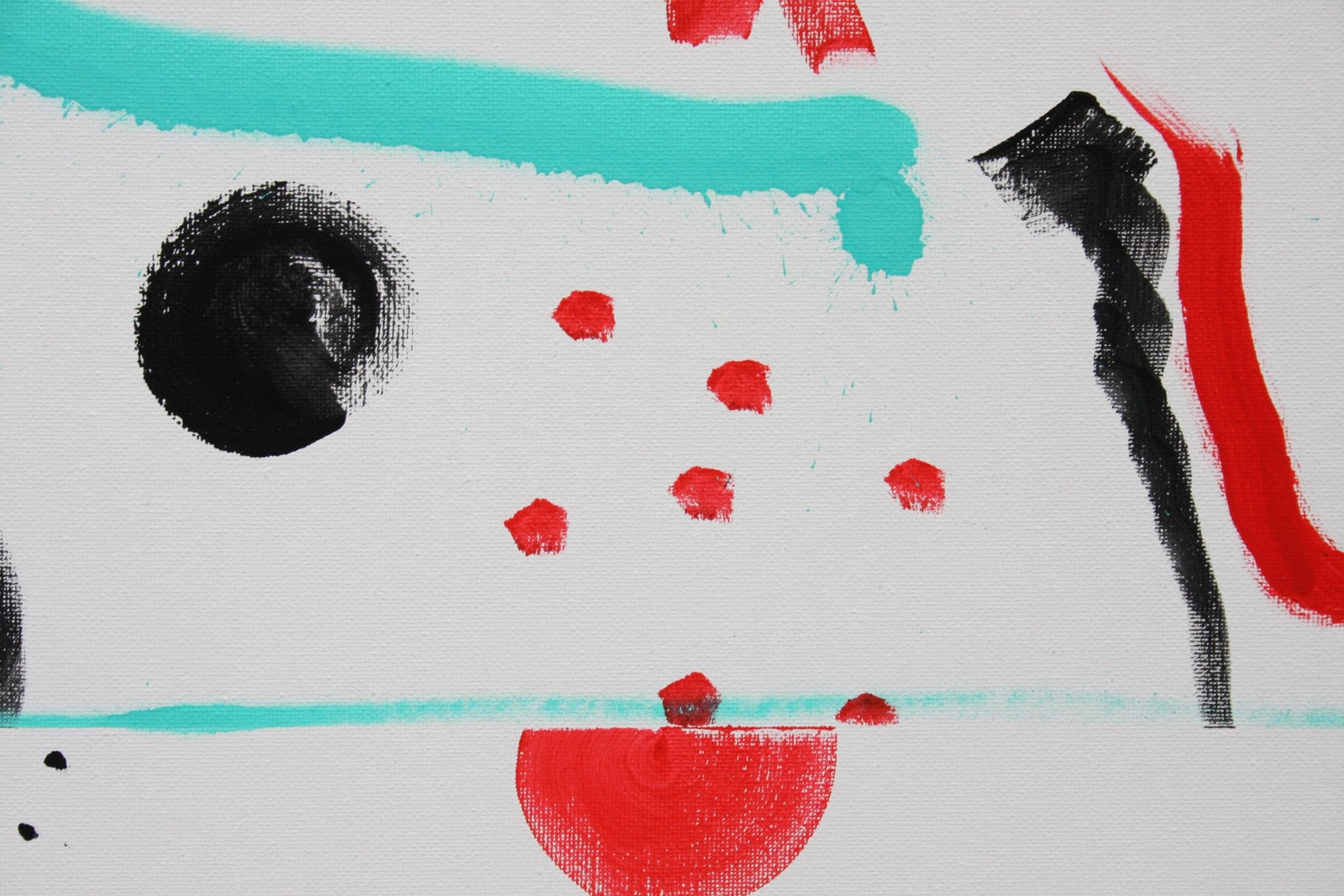 Close view: black spirals with red dots and a turquoise band along the bottom.