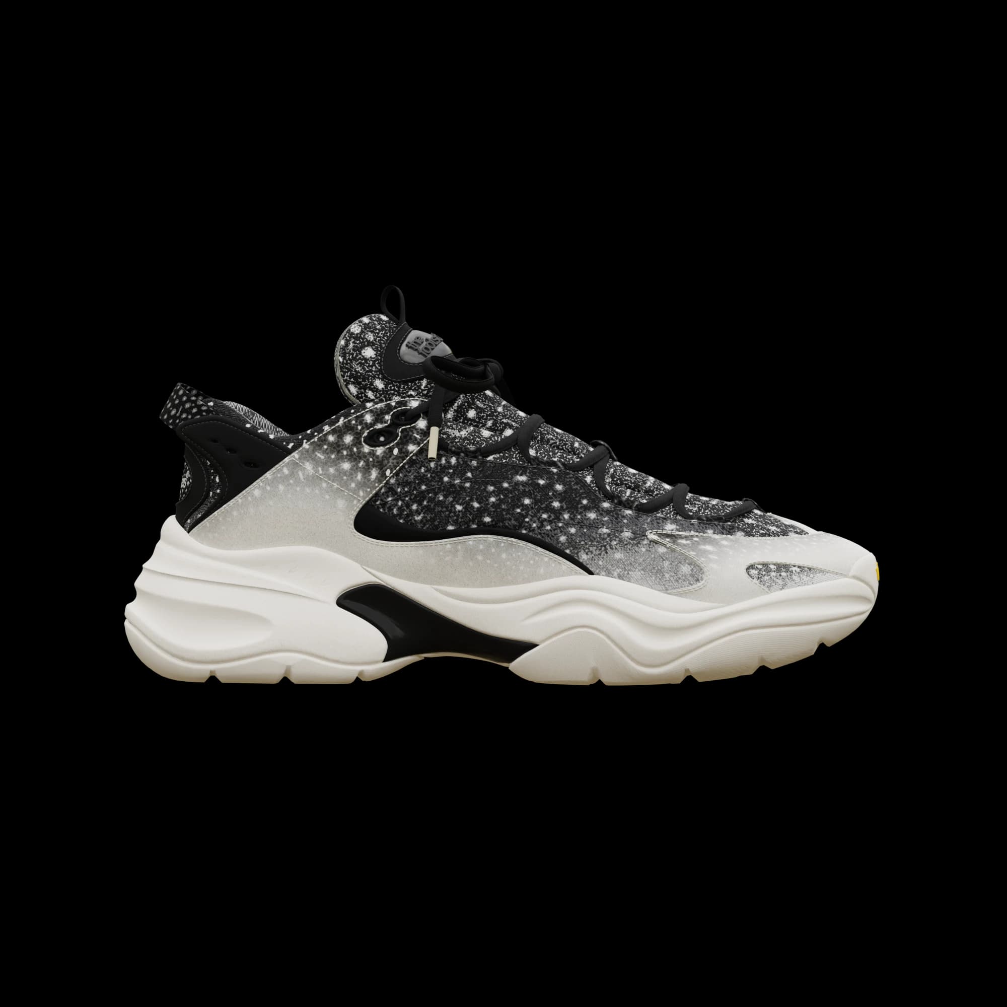 Side view of the whale-shark sneaker, black speckled upper grading to silver at the toe over a cream wave-cut midsole.