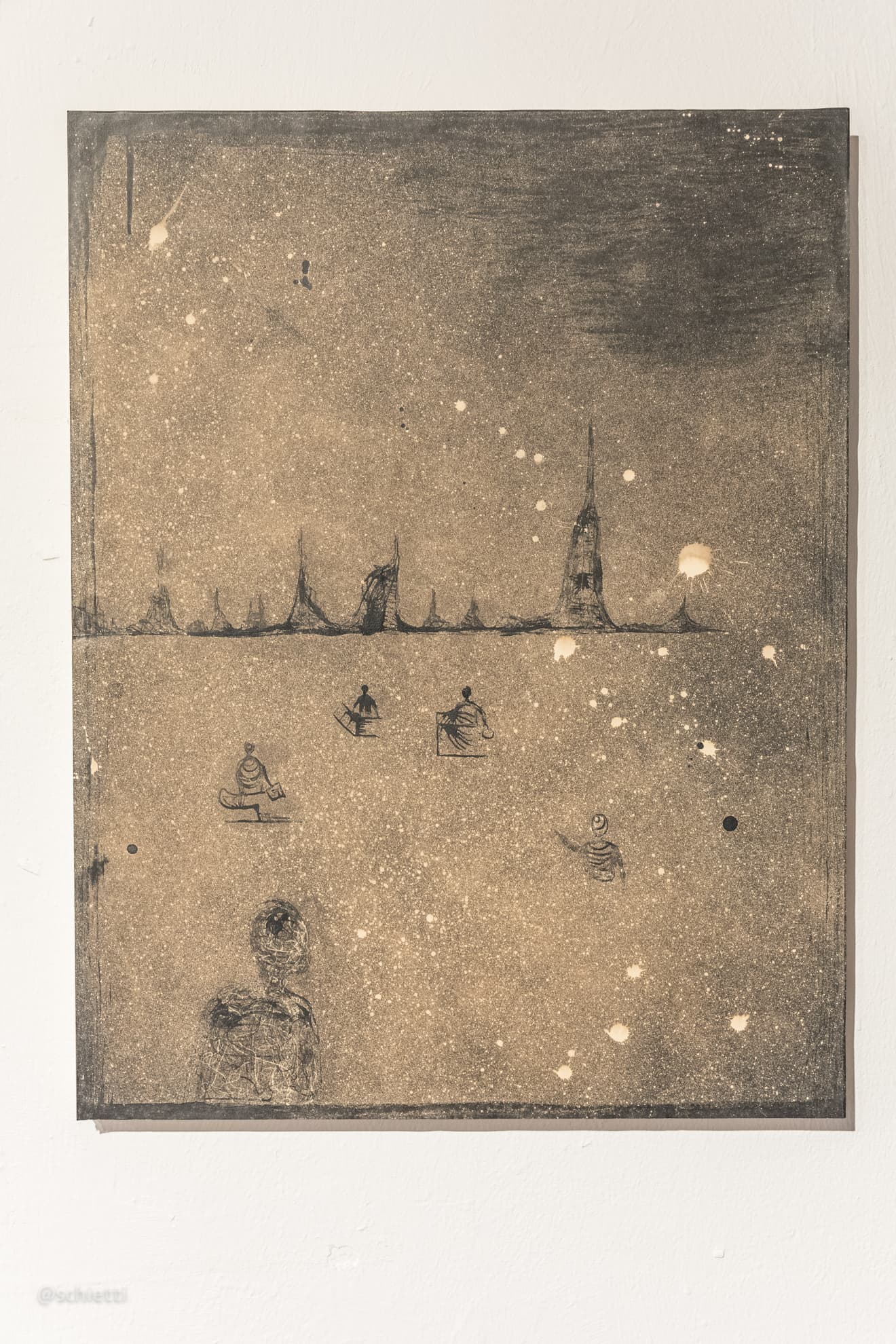 The same sheet framed under glass on a white wall at the exhibition
